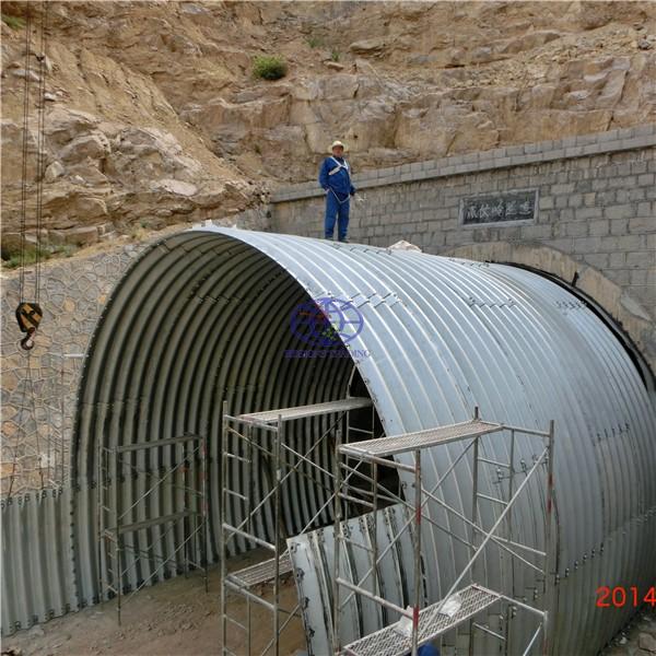 the corrugated steel culvert used to replace the concrete culvert